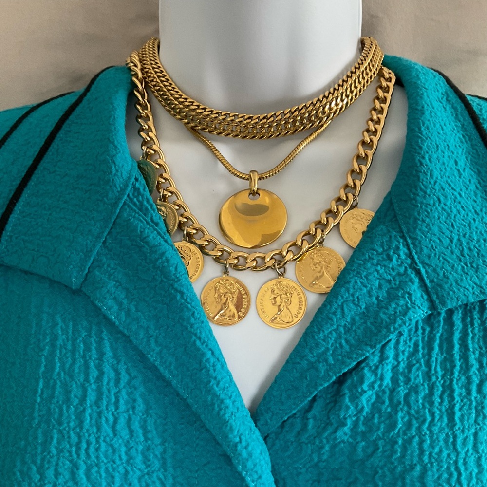 Old time faux Gold necklaces (3) in excellent condition.